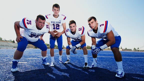 Browning is flanked on the left by teammate Cody Creason and on the right by Sam Whitney (51) and Josiah Deguara (3). Photo: James K. Leash/Sportstars.