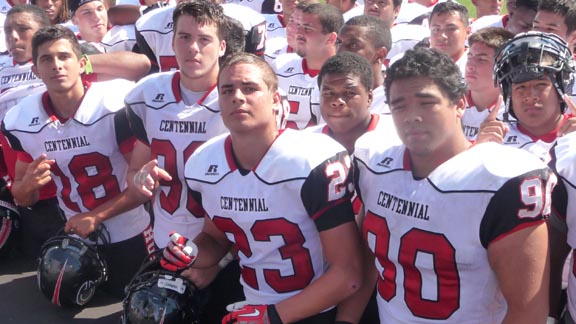 Players from No. 10 Centennial of Corona gather near the stage after team's U-T Honor Bowl win last Saturday against Orange Lutheran. Photo: Mark Tennis.