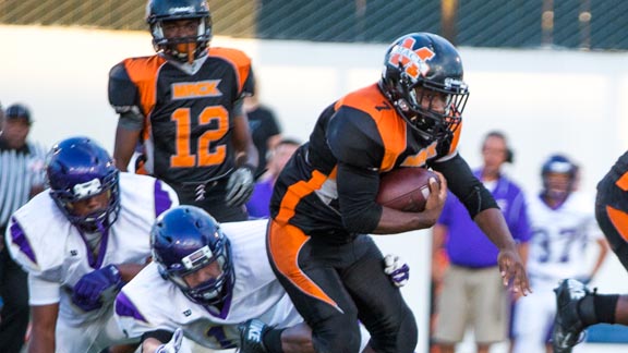 Lavance Warren of D4 North No. 2-ranked McClymonds of Oakland gets into the second level of the defense during team's big win last week over Bradshaw Christian. Photo: Everett Bass Photography.