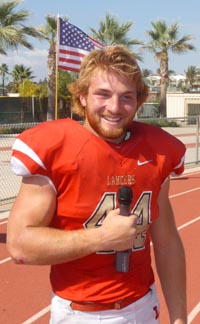 We always attempt to get flags in the background in these post-game shots and got one when Orange Lutheran standout Patrick Reardon was doing a video interview. Photo: Mark Tennis.