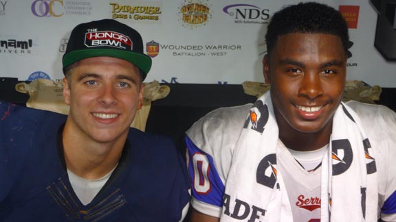 Game MVPs Sam Richmond of Bellevue and John Houston of Gardena Serra got to know each other during the game since Houston probably tackled Richmond about "10 times" during the 2014 Honor Bowl. They also visited afterward while signing game balls. Photo: Mark Tennis.