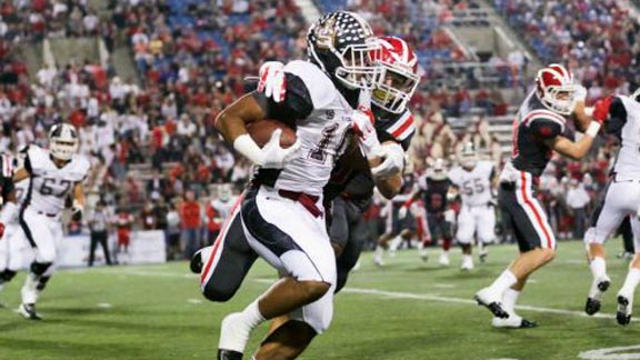 JSerra junior running back Eddie Vander is about to get tackled in game against Mater Dei of Santa Ana last Friday. Photo: Josh Barber/OCSidelines.com.