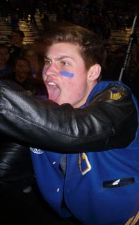 Flag-waving Foothill student was pumped up after team's win over California of San Ramon. Photo: Mark Tennis.