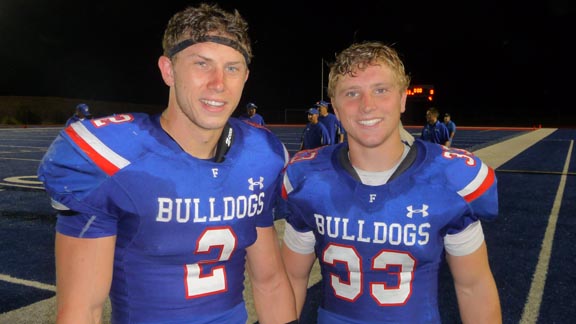 Folsom linebackers Bailey Laolagi (left) and Sam Whittingham played key roles when team blanked Granite Bay 63-0 last Friday. Photo: Mark Tennis.