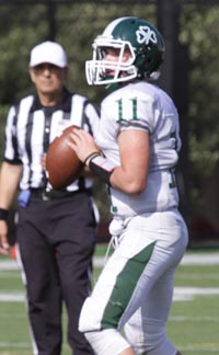 QB Logan White looks downfield during recent game. He has helped the Irish to a 3-0 start to their season. Photo: Willie Eashman.