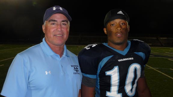 Valley Christian head coach Mike Machado stands with one of this week's South Bay/Peninsula Players of the Week, Texas-bound RB Kirk Johnson. Photo: Mark Tennis.