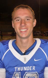 Max O'Rourke passed for five TDs, ran for another and was a kicking machine in Rocklin's big win over Oak Ridge. Photo: Mark Tennis.