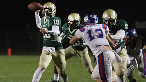 It was another shootout between Concord and Clayton Valley last Friday and Concord QB Mitch Daniels (left) led a spirited comeback that fell just short in 48-40 loss. Photo: Willie Eashman.