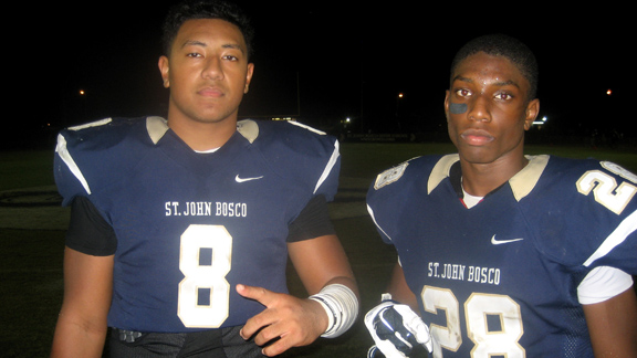 St. John Bosco LB Nas Anesi (left) and CB Traveon Beck had two of the three fumble recoveries that Mater Dei QB Jack Lowary lost, including a 69-yard return for a score by Beck that proved to be the difference in the Braves' 28-25 victory. Photo: Ronnie Flores