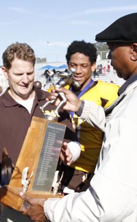Mission coach Joe Albano accepts San Francisco Section trophy from commissioner Don Collins. Photo: Willie Eashman.