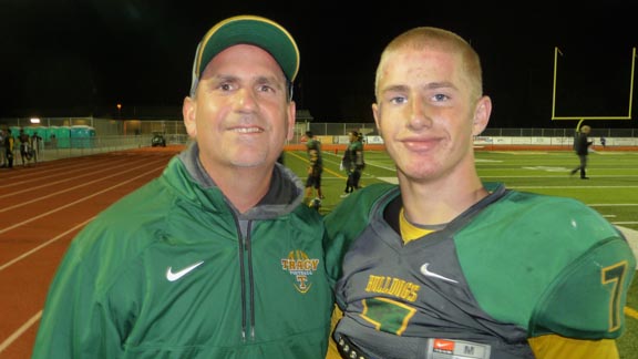 Michael Brown, the quarterback for NorCal bubble team Tracy, stands with his father, Tim Brown, local chiropractor and someone we covered when he was the best player in town back in the days when Tracy only had one high school. Photo: Mark Tennis.