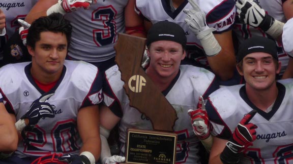 Adam Remotto (holding trophy) was the hero for Campolindo in win over El Capitan for D3 state title with an 84-yard fumble return TD with 51 seconds left. Photo: Mark Tennis.