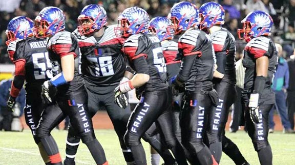 The Clayton Valley of Concord offense breaks its huddle in game vs. Concord. The Ugly Eagles are the No. 2 rushing team in the nation, according to MaxPreps. Photo: Courtesy school.