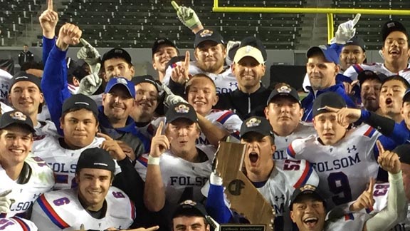 Folsom players and coaches were excited after winning the CIF Division I state championship last December in Carson. Photo: Mark Tennis.