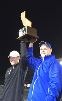 Folsom' co-coaches Troy Taylor & Kris Richardson raise 2014 CIF state title plaque. Richardson will be by himself as head coach this season. Photo: Mark Tennis.