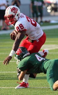 Adam Taylor was the star running back for Katy High's 2012 FAB 50 national championship team. Photo: Courtesy Katy Times.