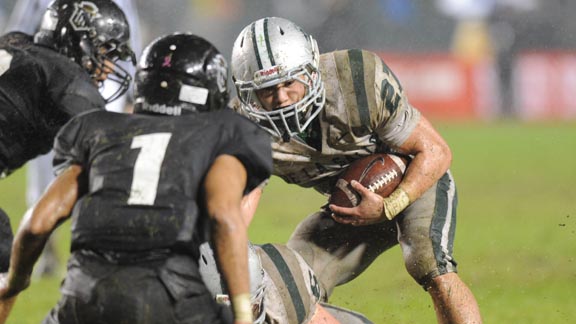 Lucas Dunne of Concord De La Salle looks for running room during 2010 CIF Open Division state championship game against Servite of Anaheim. Photo: Scott Kurtz.