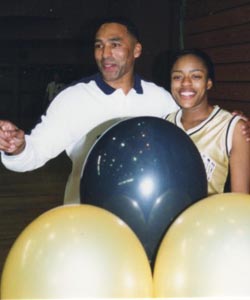 Former NFL great Roger Craig and his daughter, Rometra, when she played basketball at Archbishop Mitty of San Jose. Photo: Mark Tennis.