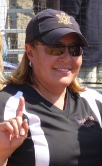 Amador Valley head coach Teresa Borchard signals her team's finish in at least one national ranking from last season. Photo: Mark Tennis.