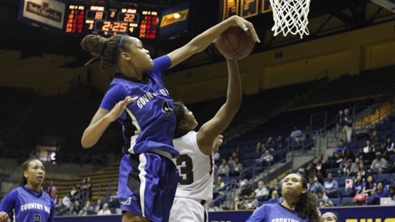 Alysia Sayles collects one of her nine blocked shots for La Jolla Country Day in her team's four-point win over Eastside Prep in the CIF Division V final. Photo: Willie Eashman.