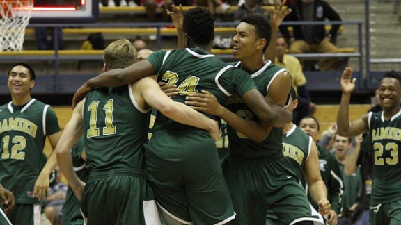 Damien of La Verne players get pumped at center court moments after the final horn sounded in the CIF Division III state final at Haas Pavilion. Photo: Willie Eashman.