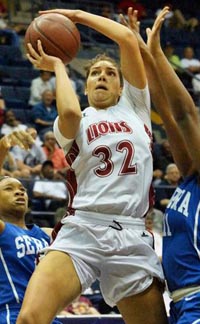 Junior center GiGi Garcia goes up for a shot in Sacramento McClatchy's 2 OT win against Gardena Serra. Photo: Phillip Walton/SportStars.