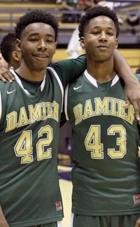 Brothers Jeremy (42) and Justin (43) Hemsley of La Verne Damien celebrate after D3 state final. Photo: Willie Eashman.
