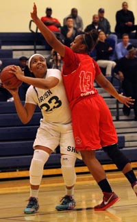 Iimar'i Thomas from Sacred Heart Cathedral of San Francisco looks for shot against Berkeley St. Mary's. Photo: Willie Eashman.