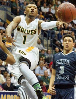 San Ramon Valley point guard Keith Smith dishes for one of his eight assists in 2 OT win over Chino Hills. Photo: Phillip Walton/SportStars.