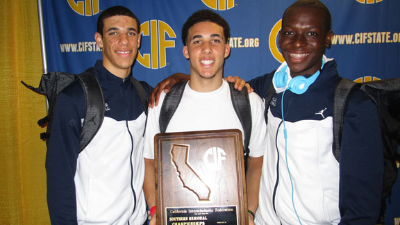 Chino Hills players Lonzo Ball, Gelo Ball and Jared Nyivih celebrate with school's first-ever CIF SoCal regional title trophy. Photo: Ronnie Flores.