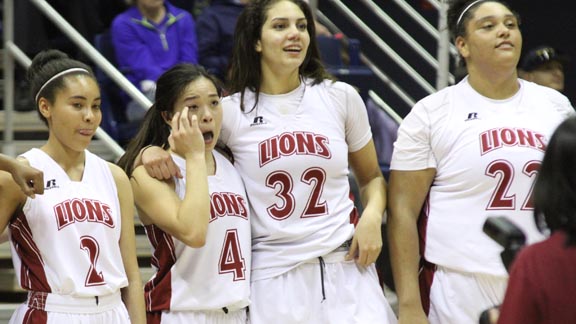 GiGi Garcia (32) and Lauren Nubla (4) show some emotion just after their team at McClatchy of Sacramento won CIF Division I state crown. Photo: Willie Eashman.
