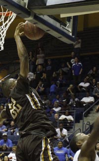 Crespi's De'Anthony Melton blocks shot that would have won game for Capital Christian in D4 state final. Photo: Willie Eashman.