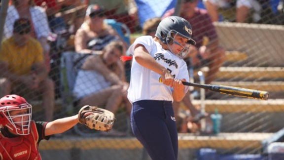 A Yucaipa hitter has made contact with a pitch thrown by Mission Viejo's Taylor McQuillin during title game of Michelle Carew Classic. Photo: Patrick Takkinen/OCSidelines.com.