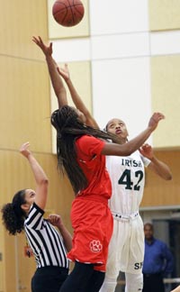 It's a jump ball between all-state second team overall players Ma'Ane Mosely of Berkeley St. Mary's and A'shanti Coleman of S.F. Sacred Heart Cathedral. Photo: Willie Eashman.