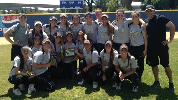 Archbishop Mitty team holds hardware following win over unbeaten Pioneer in CCS D2 title game. Head coach Brian Yocke (far right) will be switching to the baseball team at Mitty next season. Photo: Harold Abend.