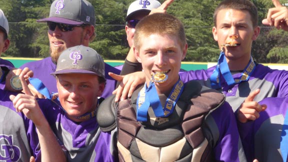 College Park catcher Willie MacIver bites down on medal during celebration after team won CIF North Coast Section Division I title. Photo: Mark Tennis.