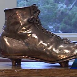 The bronzed shoe sits in the office of the winning school -- either Carmel or Pacific Grove -- until the other school wins and then gets to keep it. Photo: ksbw.com.
