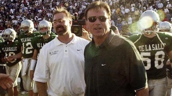 After the 2002 game between De La Salle and Long Beach Poly, DLS head coach Bob Ladouceur and athletic director/defensive coordinator Terry Eidson head toward the middle of the field at Cal's Memorial Stadium. Photo: Bob Larson/SportStars.
