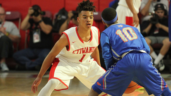 Miles Oliver of Etiwanda gets into a defensive stance versus Bishop Gorman (Las Vegas) at last year's Nike Extravaganza. Oliver is a top five junior point guard prospect in SoCal. Photo: Andrew Drennen 