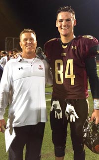 Oaks Christian head coach Jim Benkert and TE/DE Colby Parkinson were happy after win last season. Photo: #D1Bound.com.