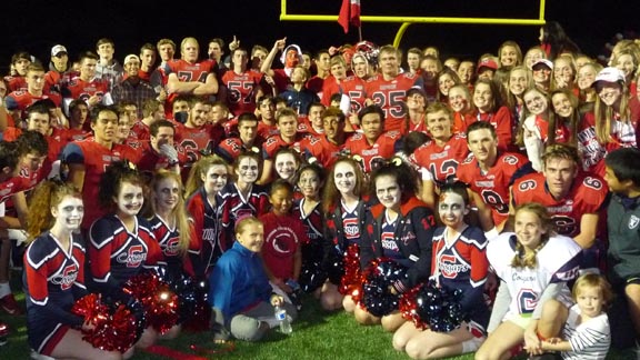 Cheerleaders, students and players were all one big happy family after Campolindo's 37-0 triumph on Friday in Moraga over Miramonte. Photo: Mark Tennis.