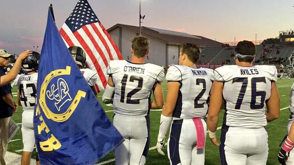 Players from San Juan Hills get ready before last Thursday's game vs. Beckman of Irvine. QB Patrick O'Brien (12) led team to 61-24 victory. Photo: @SJHHSFootball (Twitter.com).