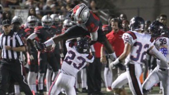 Rancho Verde of Moreno Valley RB Jamal Scott goes airborne during recent game. He and team are now state-ranked in our D2 grouping. Photo: rvathletics.com.