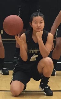 Krissy Miyahara poses for the camera during recent photo shoot at Archbishop Mitty. Photo: Courtesy school.