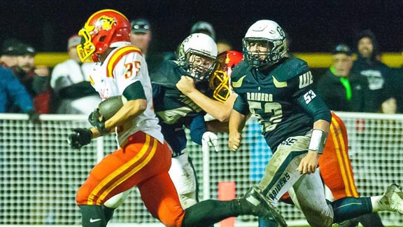 Bobby DePuy of Oakdale races toward corner of end zone on two-point conversion attempt in last Friday's game vs. Central Catholic of Modesto. Holding was called and a longer two-point attempt failed. Photo: Jim Johnson/jimjphotos.com.