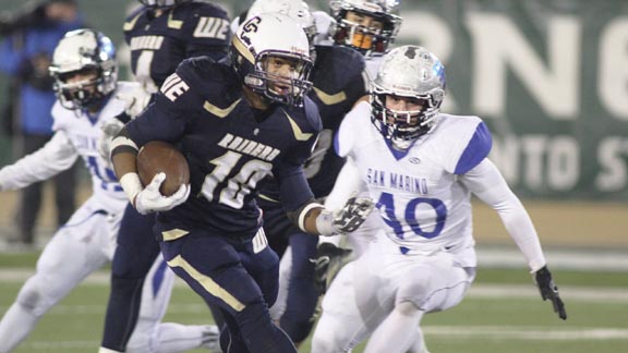 Central Catholic's Montell Bland looks for yardage in state bowl game vs. San Marino. In our five-division format, both teams ended up with No. 1 rankings. Photo: Willie Eashman.