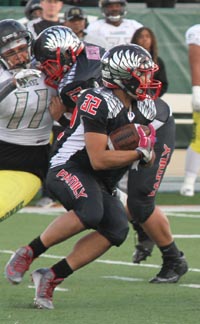 Clayton Valley's Jake Peralta operates in the backfield during Ugly Eagles' game vs. Narbonne in CIF Division I-A state bowl game. Photo: Willie Eashman.