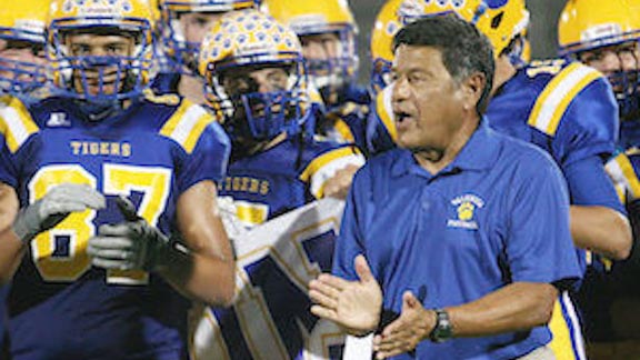 Mike Marrujo of Placentia Valencia applauds his players after he achieved his 300th career victory. He recently announced retirement. Photo: Laura Nunez/OCSidelines.com.