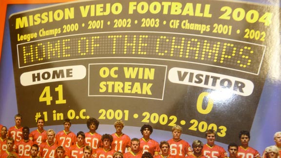 This image is from undefeated State Team of the Year Mission Viejo's 2004 program cover. Wearing No. 6 at bottom is future NFL QB Mark Sanchez. 