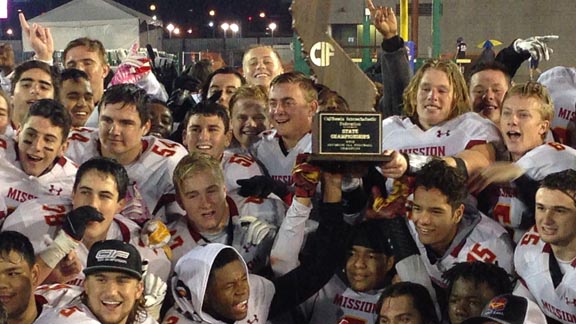 Mission Viejo players are pumped up before the cameras after they blanked Bellarmine of San Jose 24-0 in Friday's CIF Division I-AA state bowl game. Photo: Paul Muyskens.